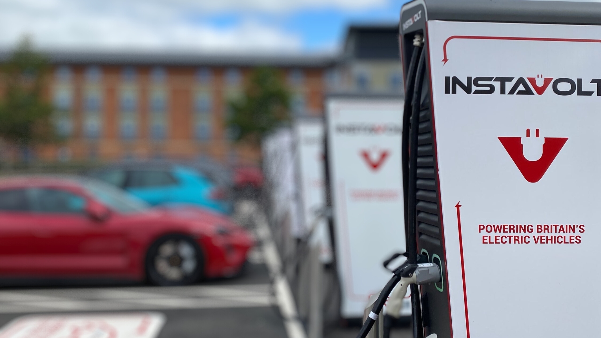 Red Tesla at Instavolt charger